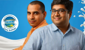 Chakradhar Gade and Nitin Kaushal, co-founders of Country Delight, featured alongside the Country Delight logo representing India's leading direct-to-consumer dairy and fresh food brand.