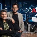boAt founders with headphones and wireless earbuds, representing the Indian consumer electronics and audio brand.