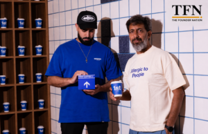Founders of First Coffee holding branded coffee products with TFN, The Founder Nation branding