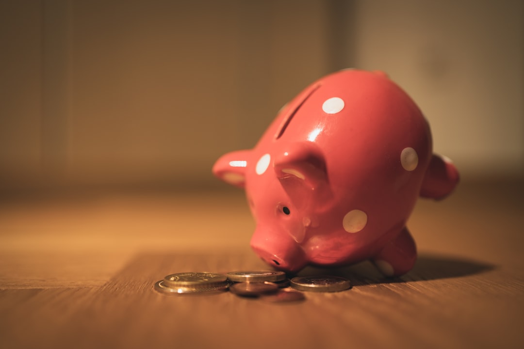 Piggy bank and calculator representing savings plans for kids