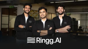xRingg.AI founding team posing at their office in India.
