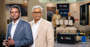 QNu Labs leaders with quantum technology equipment and networking infrastructure in the background.